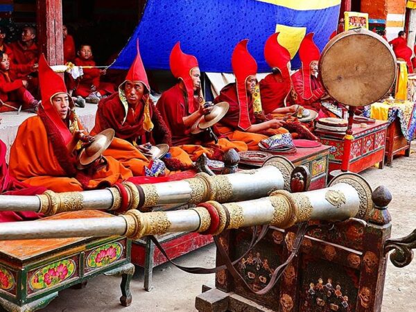 tiji festival - lamas are playing instruments