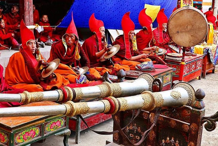 tiji festival - lamas are playing instruments