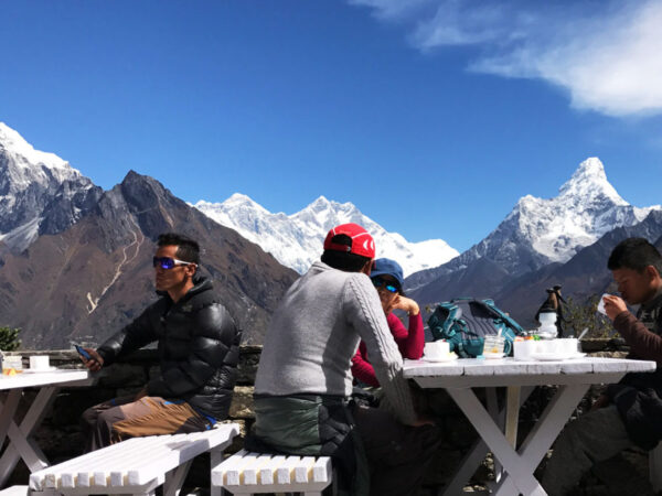 Trekkers enjoying mountain view from Everest Hotel