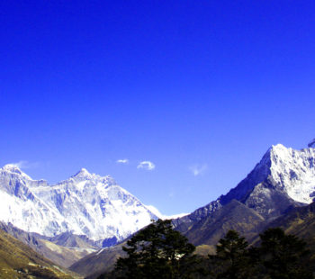 Foreground view of Ama Dablam and background view of Everest and surrounding peaks