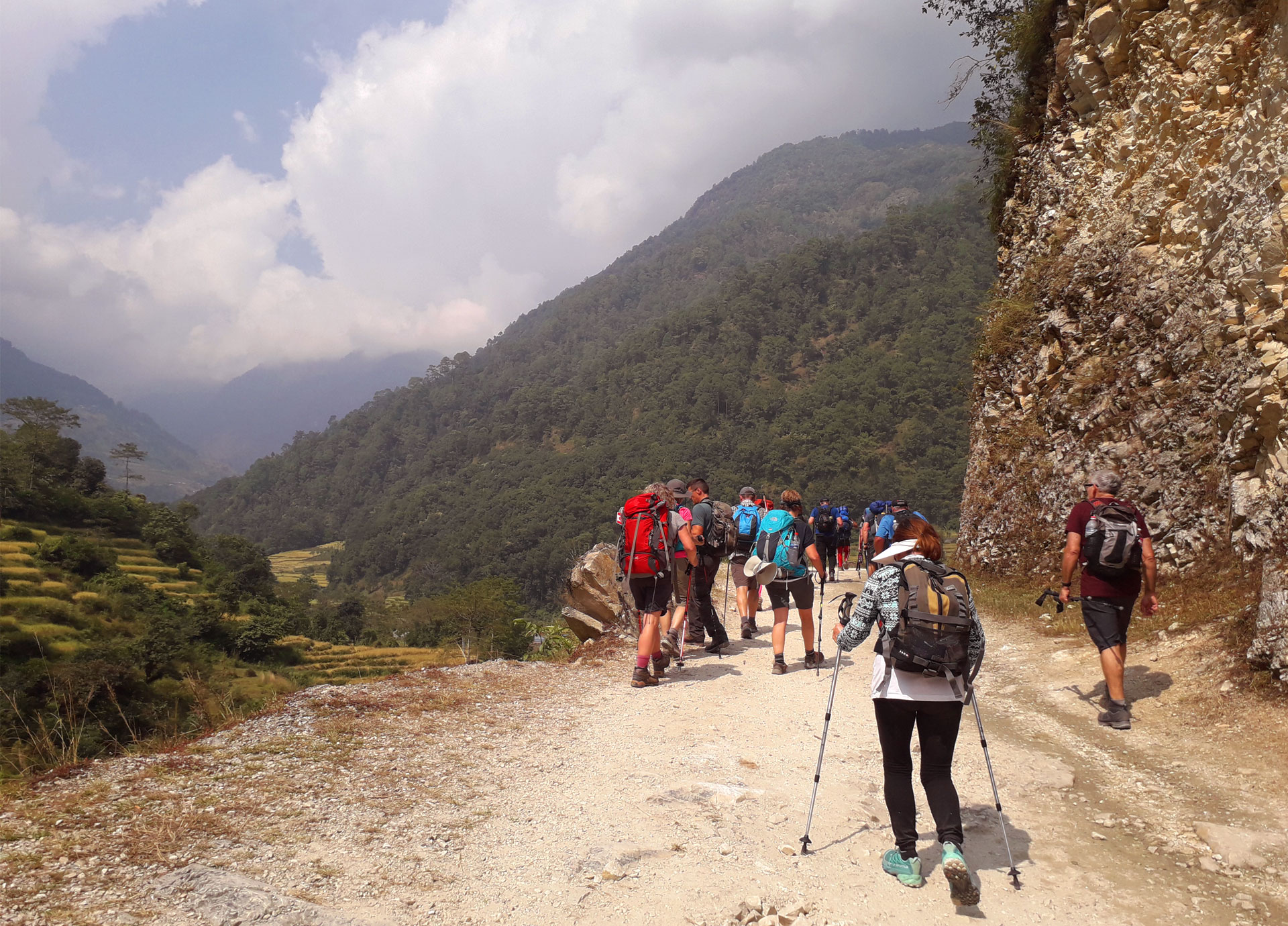 trekkers - on the way to mountain trekking in Nepal