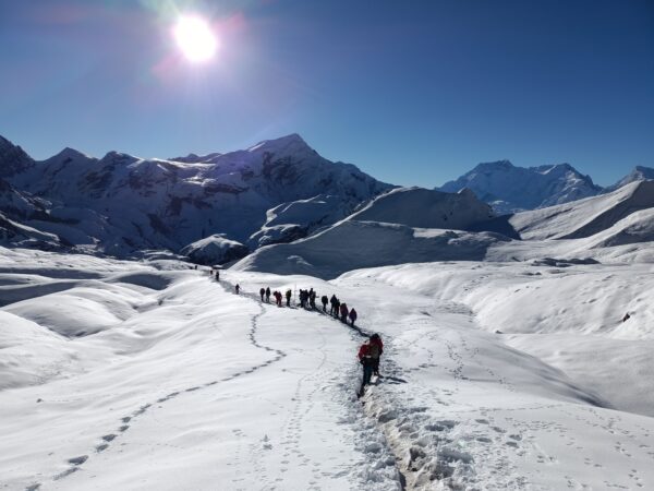 Trekkers in Larkya Pass