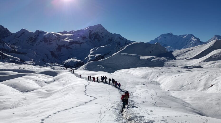 Trekkers in Larkya Pass